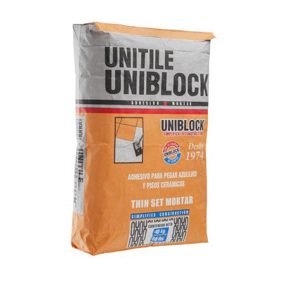 Comprar PEGA AZULEJO UNITILE GRIS 20 KG. Pisos y azulejos en México